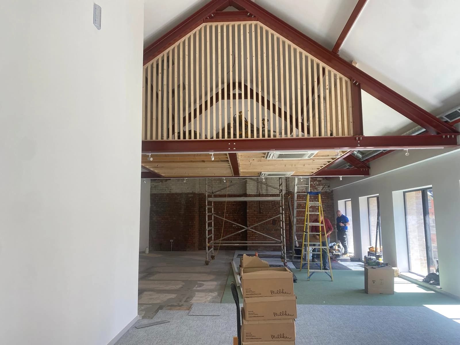 Cornmarket Belfast - timber-slat mezzanine and structural steel in the vaulted hall
