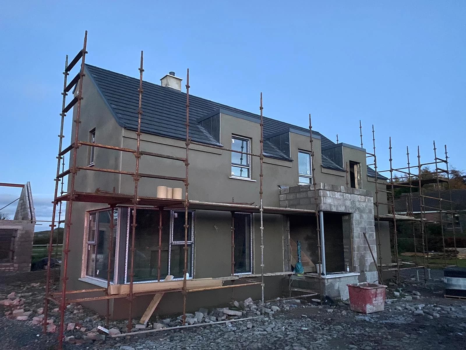 Royal Hillsborough - private residence during external render, with roof and windows in